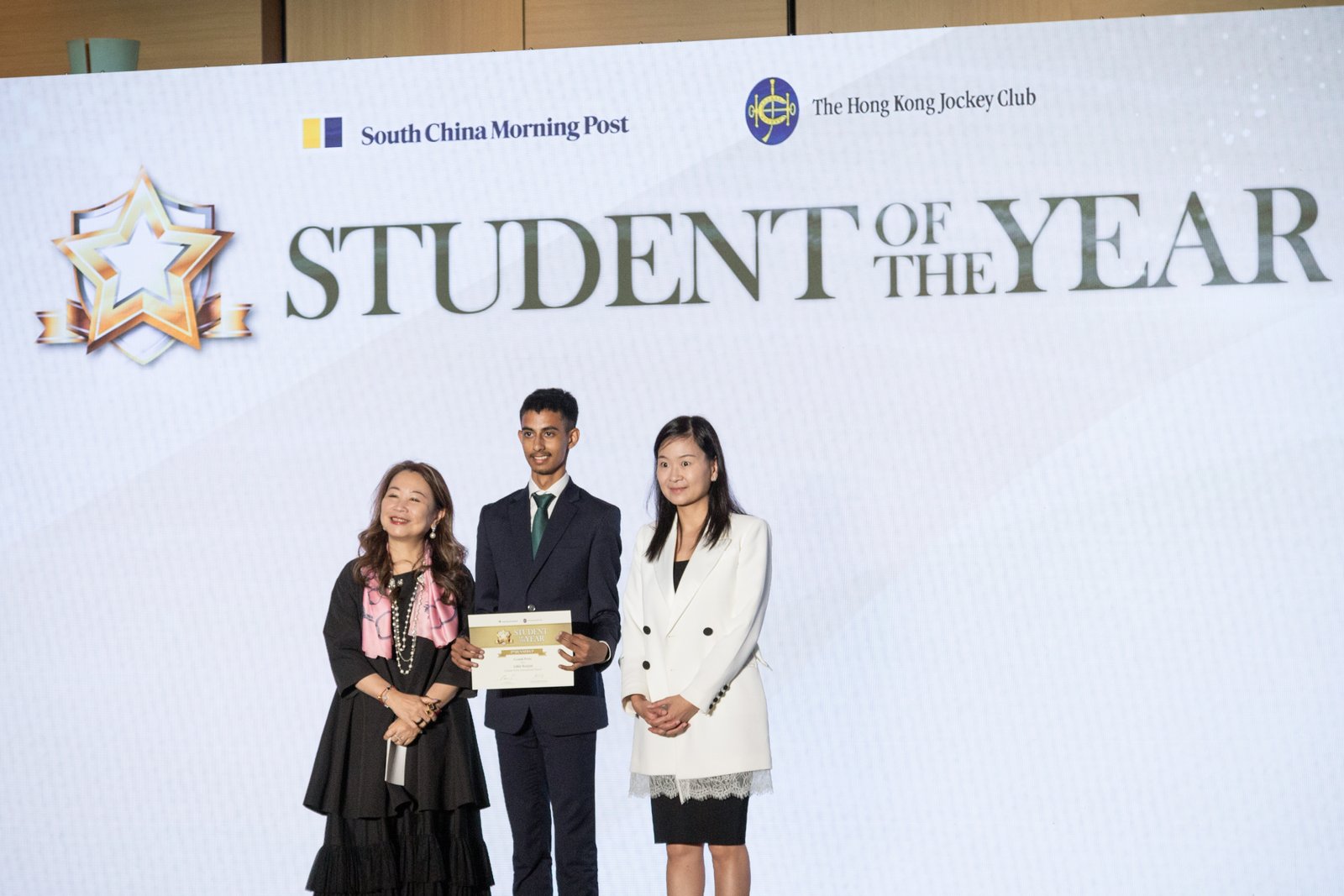 Adhit Ranjan receiving certificate and award from respected Professionals